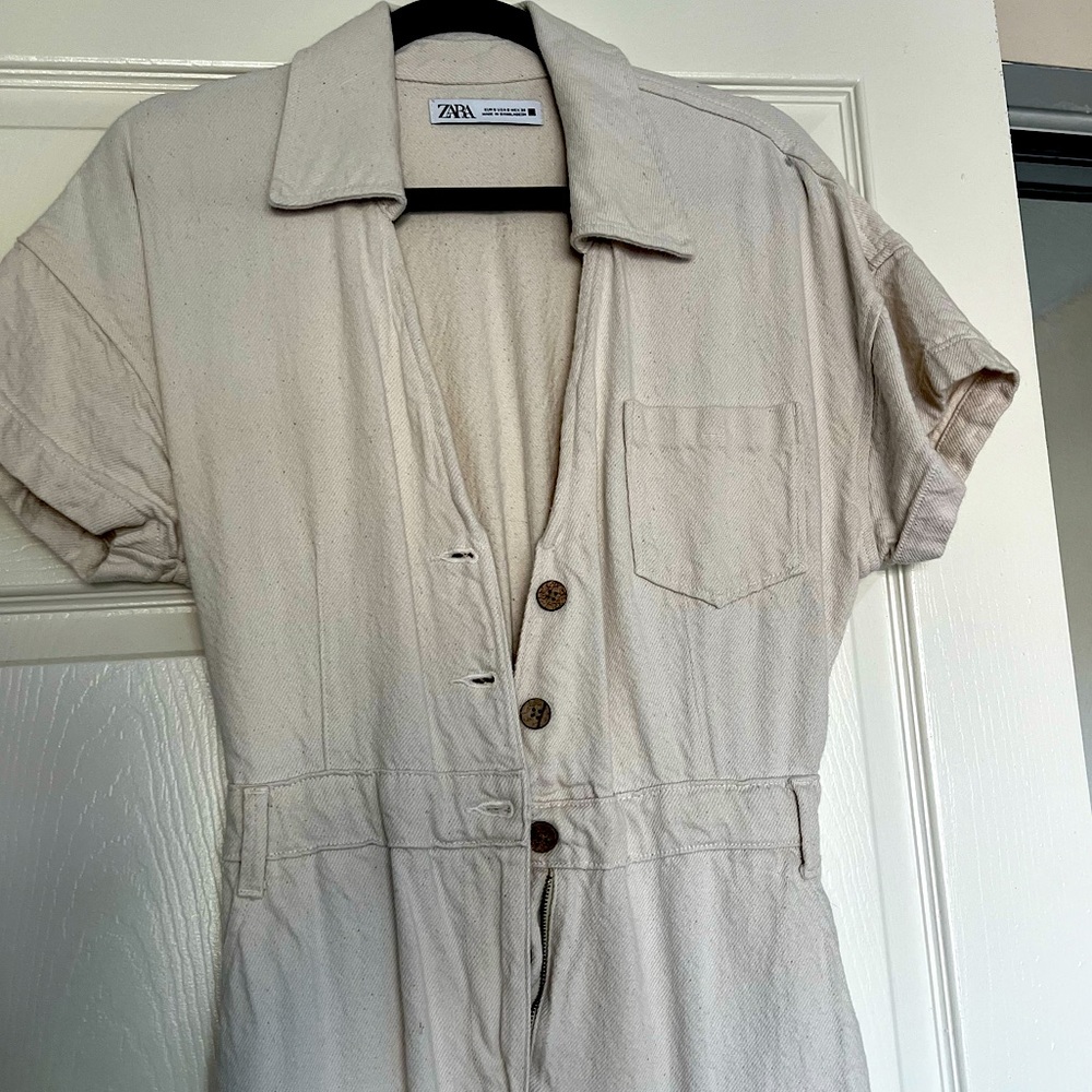Small, cream colored Zara jumpsuit